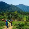 Hiking through the tiny village of Doong in central Vietnam's Phong Nha-Ke Bang National Park. Photo by Michael Tatarski for Mongabay.