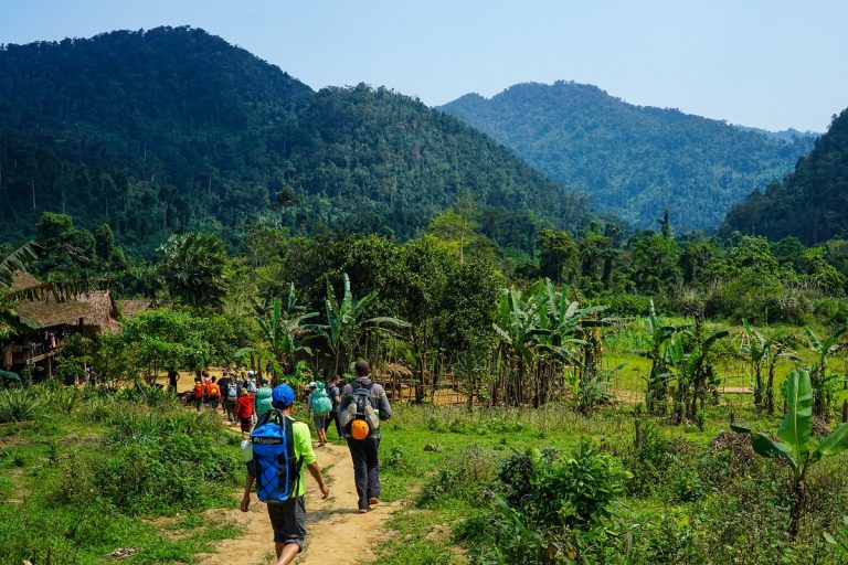 Hiking through the tiny village of Doong in central Vietnam's Phong Nha-Ke Bang National Park. Photo by Michael Tatarski for Mongabay.