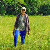 Indigenous farmer Leopoldo Lebuna weeds his lowland farm