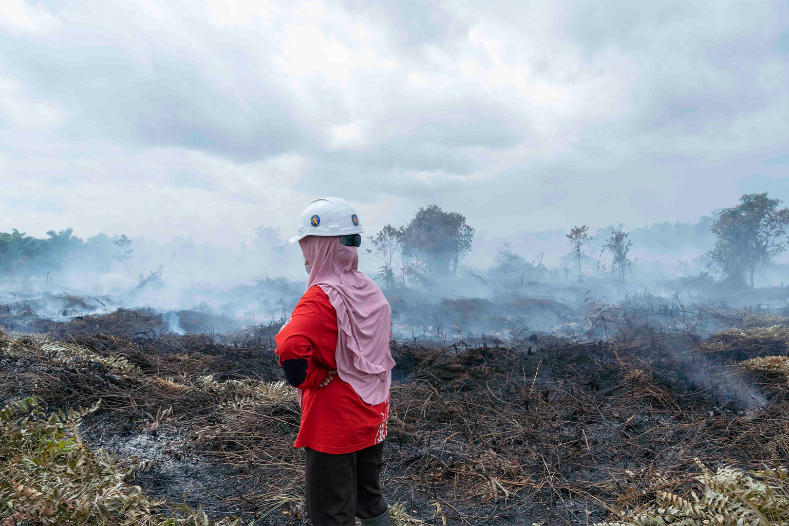 A Power of Mama volunteer firefighter in West Kalimantan. 