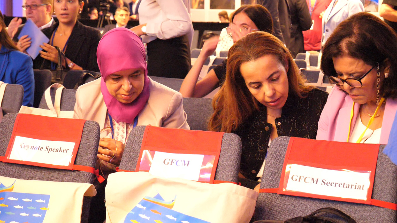 Attendees to the conference, including Zakia Driouich (left) from Morocco.