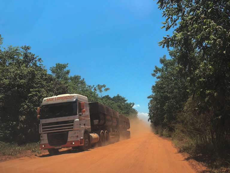 A freight truck plies MT-322. Plans to pave the road have been lauded by agribusiness leaders but condemned by conservationists and local Indigenous groups. Image by Ana Ionova for Mongabay.