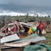 Ogiek recovering belongings from a house demolished by Kenya Forest Service officers. Image courtesy OPDP.