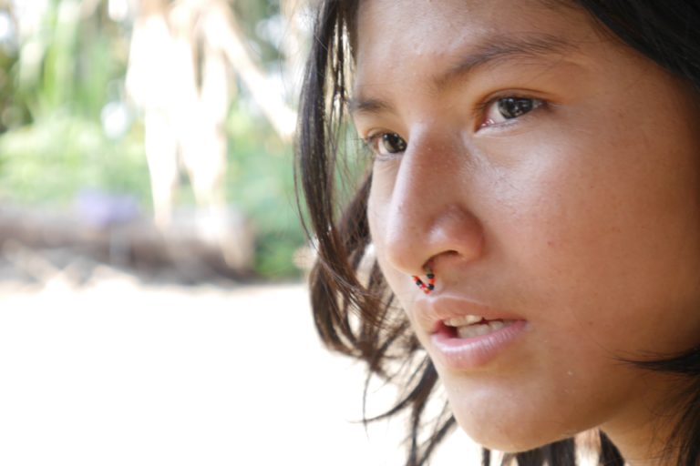 A recently contacted Machiguenga girlon the outskirts of Manu National Park in Cusco. Image by Ronald Reategui.